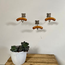 Load image into Gallery viewer, Vintage pine and steel coat hooks