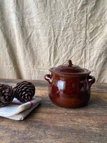 Vintage terracotta pot with lid