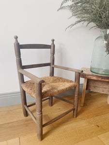 Vintage straw seat child’s armchair