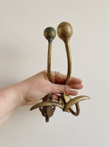 Pair of Antique French brass hat and coat hooks