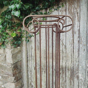 Vintage wrought iron Greek style garden column