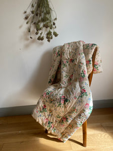 Vintage handmade floral cotton quilt, wool filling