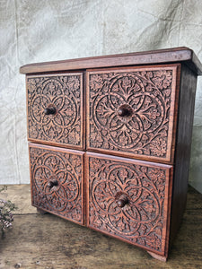 Handmade rosewood carved table top chest of drawers