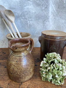 Small handmade rustic pottery jug