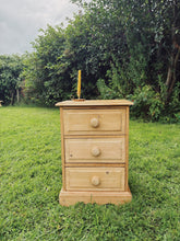 Load image into Gallery viewer, English pine three drawer bedside cabinet