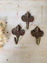Load image into Gallery viewer, Vintage brass cherub towel or coat hooks
