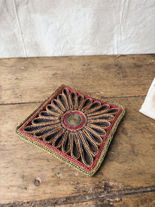 Vintage 1970s straw trivet
