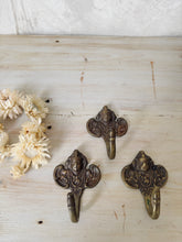 Load image into Gallery viewer, Vintage brass cherub towel or coat hooks