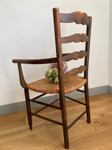 Vintage French ladder back straw armchair