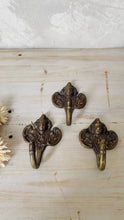 Load image into Gallery viewer, Vintage brass cherub towel or coat hooks