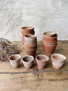 Antique hand thrown terracotta seedling pots