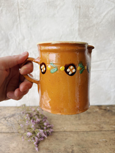 Hand painted terracotta milk jug