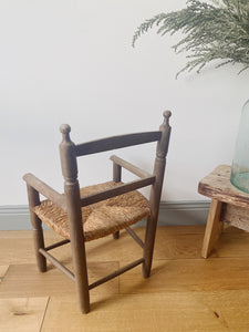 Vintage straw seat child’s armchair