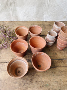 Antique hand thrown terracotta seedling pots