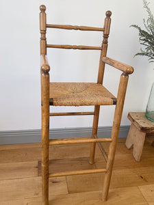 Vintage French high chair in oak and straw seat