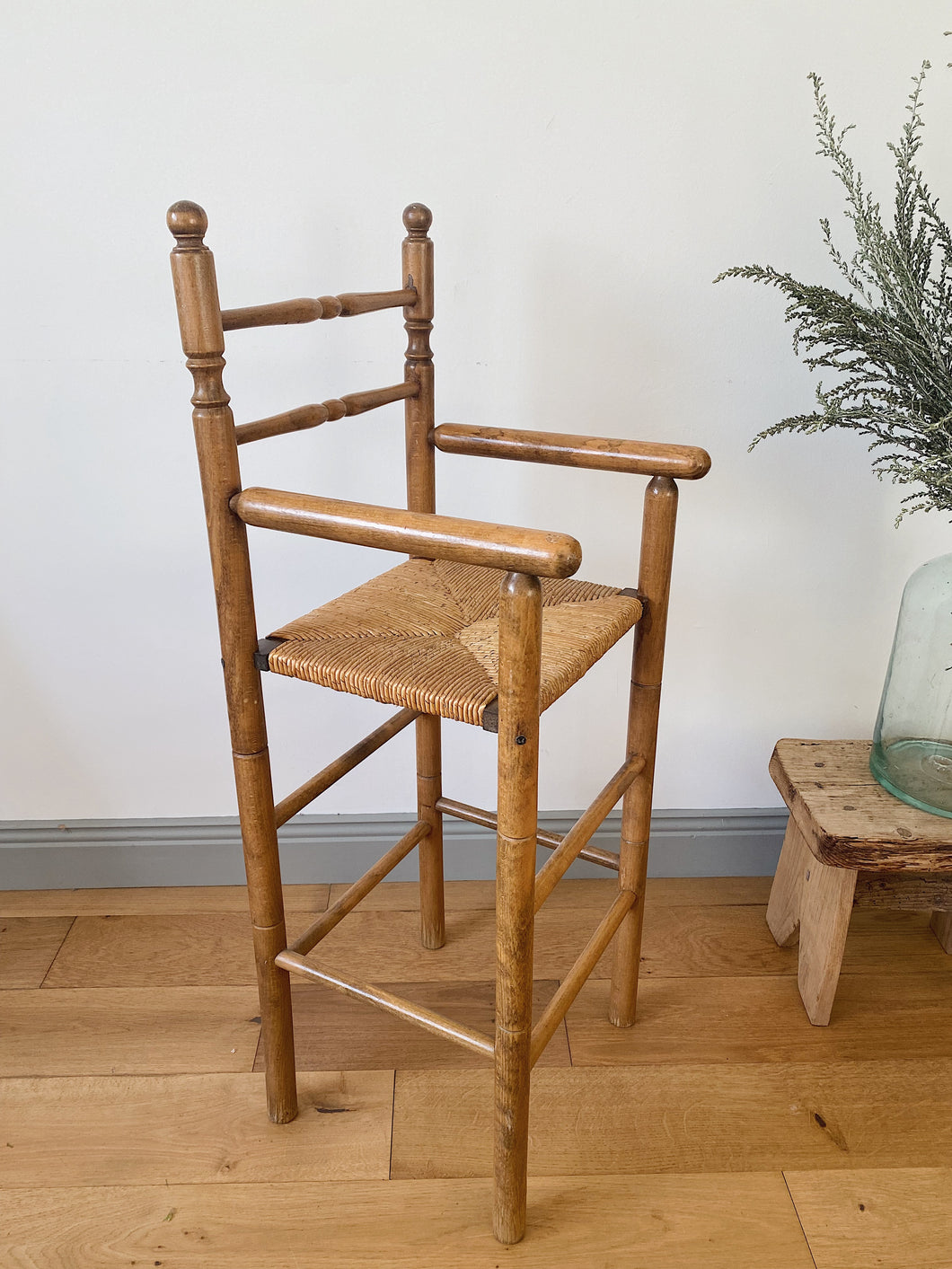 Vintage French high chair in oak and straw seat