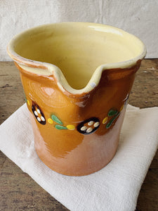 Hand painted terracotta milk jug
