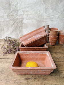 Weathered small terracotta planters