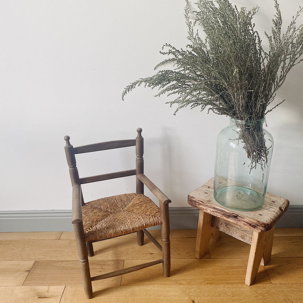 Vintage straw seat child’s armchair