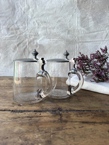 Vintage German beer steins with solid pewter flip over lid