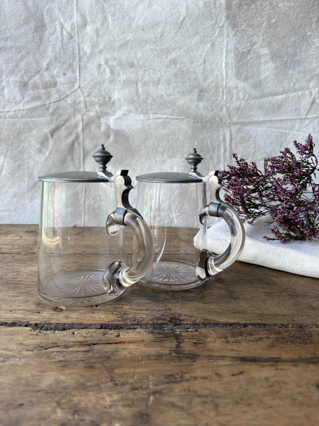 Vintage German beer steins with solid pewter flip over lid