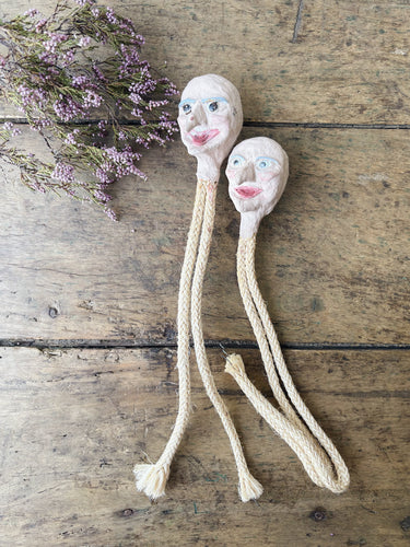Vintage papier mâché puppet heads