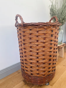 Vintage French bakery tall wicker basket on wheels