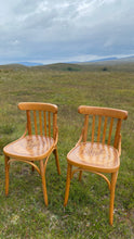 Load image into Gallery viewer, Pair of Vintage French bentwood bistro chairs