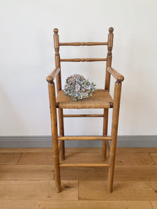 Vintage French high chair in oak and straw seat