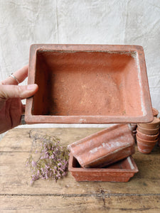 Weathered small terracotta planters