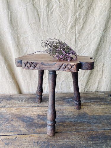 Antique primitive hand carved milking stool