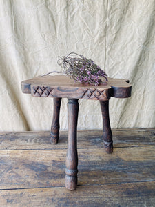 Antique primitive hand carved milking stool