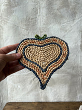 Load image into Gallery viewer, Vintage 1970s heart shaped straw trivets - set of 3