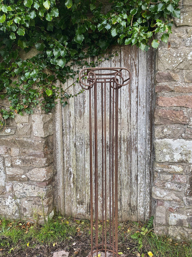 Vintage wrought iron Greek style garden column