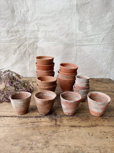 Antique hand thrown terracotta seedling pots