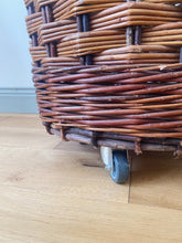 Load image into Gallery viewer, Vintage French bakery tall wicker basket on wheels