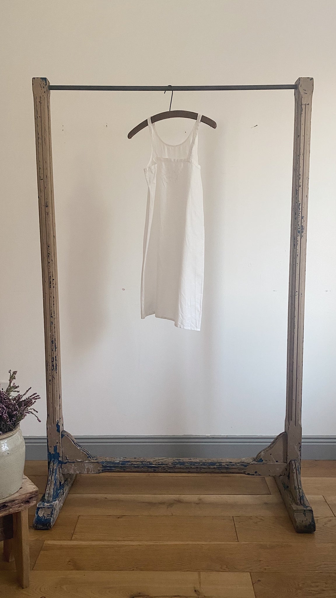 Vintage shop freestanding clothes rail – Scenes Stories