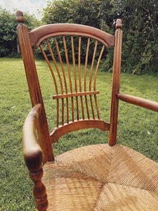 1940s fruitwood and rush seat armchair