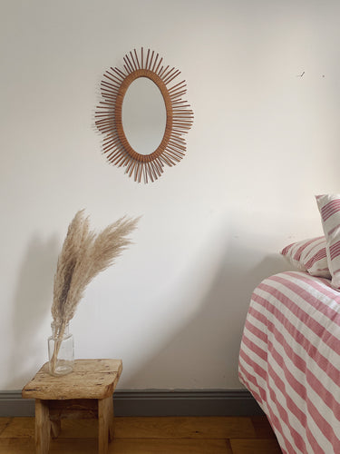 Vintage French sunburst wicker mirror