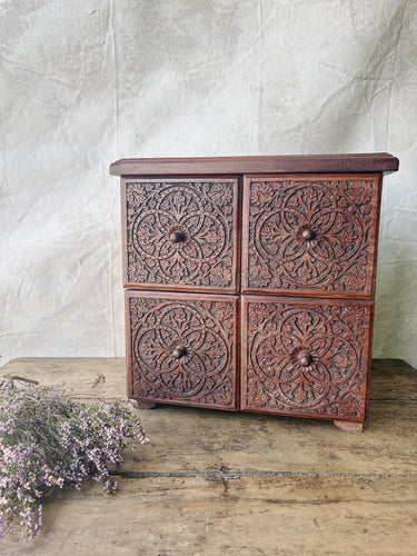 Handmade rosewood carved table top chest of drawers