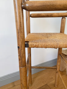 Vintage French high chair in oak and straw seat