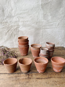 Antique hand thrown terracotta seedling pots
