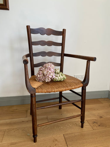 Vintage French ladder back straw armchair