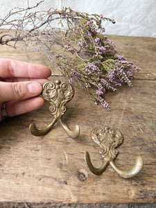 Pair of Antique brass hooks
