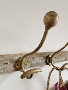 Pair of Antique French brass hat and coat hooks