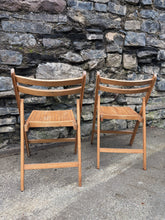 Load image into Gallery viewer, Pair of vintage slatted folding chairs