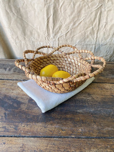 Vintage French coiled straw bread or fruit basket