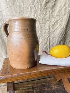 Vintage handmade sandstone milk jug