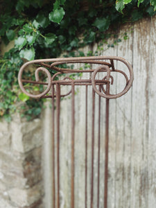 Vintage wrought iron Greek style garden column