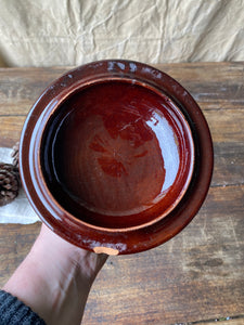 Vintage terracotta pot with lid